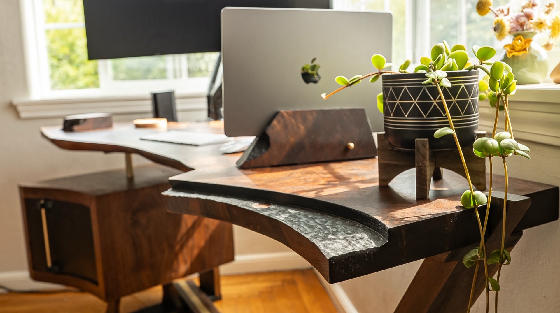 Lani Leads cantilever desk in Claro and black walnut